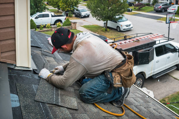 Professional Roofing technician working in Clark, NJ